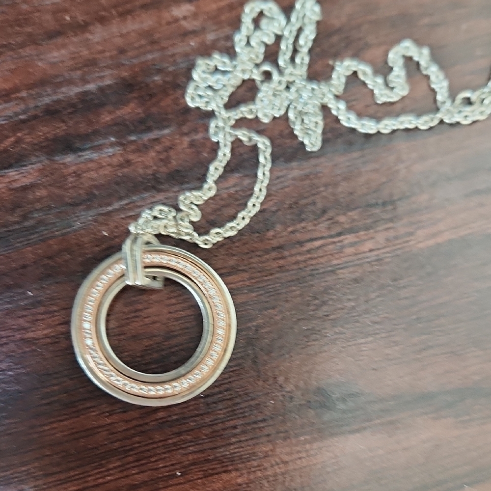 Elegant Silver and Gold-Tone Pendant Necklace